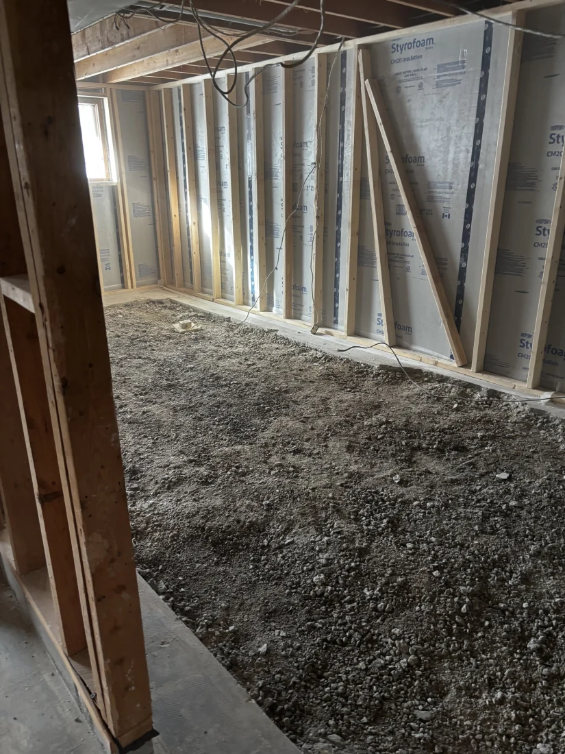 Basement with the concrete floor removed down to the gravel