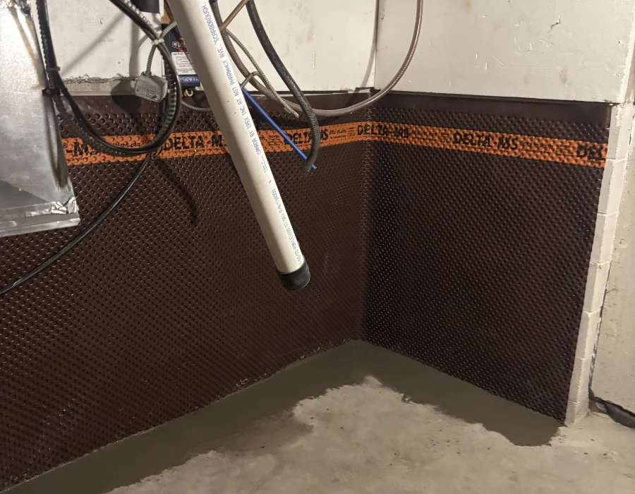 New concrete floor patch against the waterproofing membrane