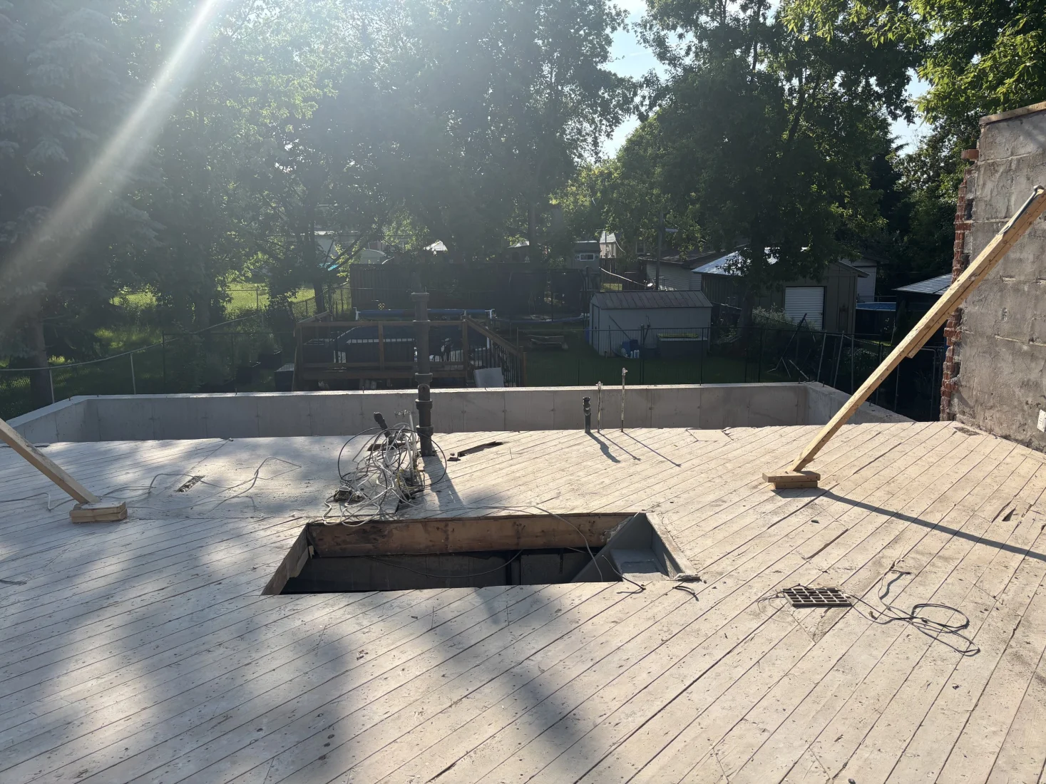 Floor deck after the upper floor came off, with the chimney braced