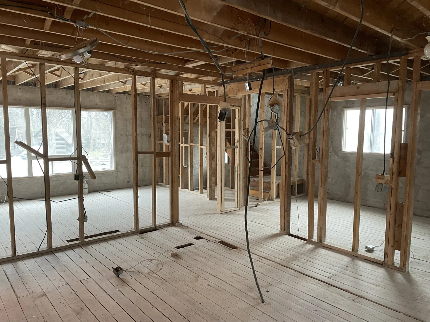 Main floor gutted to the wall framing and concrete block walls